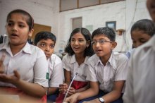 A group of students in Karakati, India, research the answer to a big question at one location of Sugata Mitra's School in the Cloud. According to Mitra and Adam Braun, there's a lot that Western schools can learn about education from students in India.