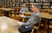 Mike Taylor, consultant with Window to Leadership, speaks before a scheduled open community forum at Fremont Middle School in Roseburg on Friday. The forum was called off as no one attended.