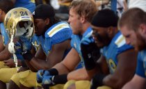 Paul Perkins (24) reacts late in the second half of UCLA's 31-10 loss to Stanford at the Rose Bowl on Nov. 28, 2014. (Keith Birmingham/Staff)